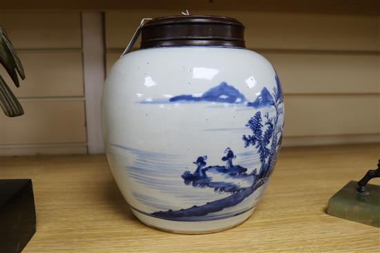 A Chinese blue and white ovoid jar, 18th century, total height 23.5cm including pierced wood cover